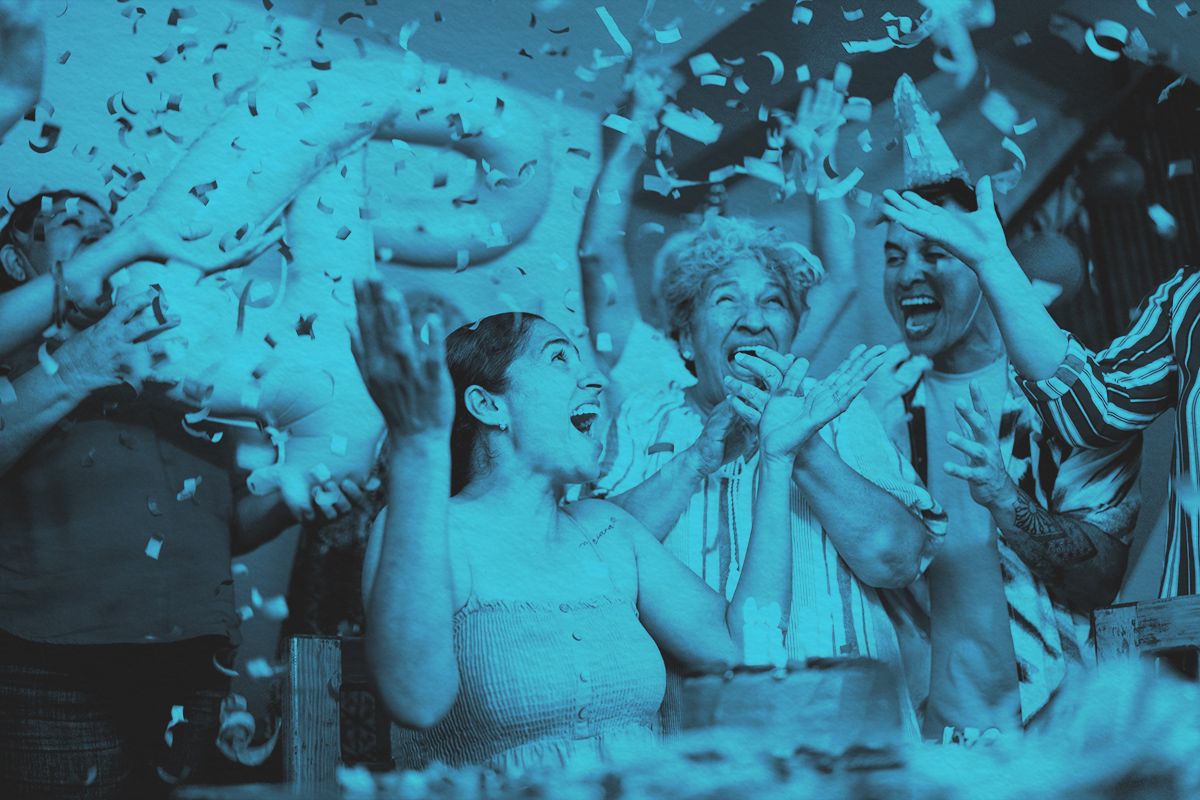 woman celebrating birthday with family at home