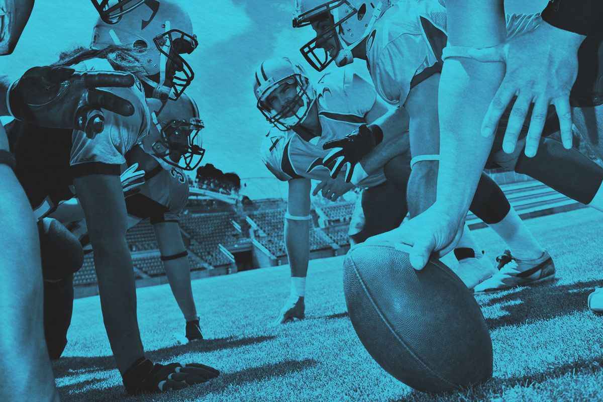 Group of men getting ready to play football