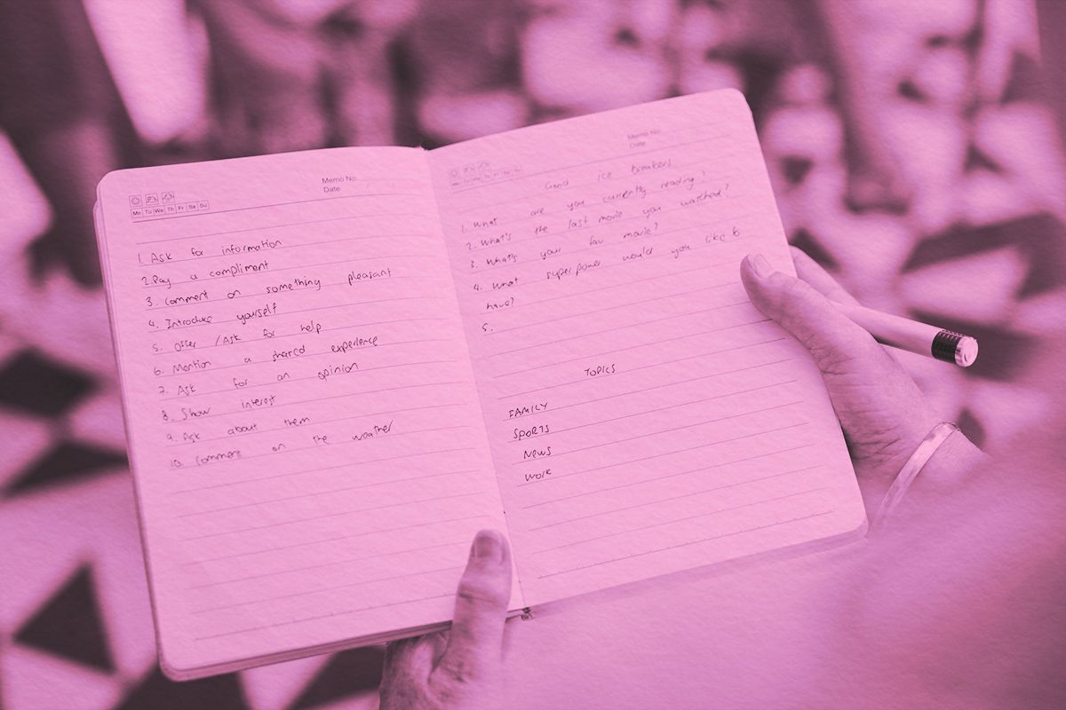 Close-up of notebook with writing inside