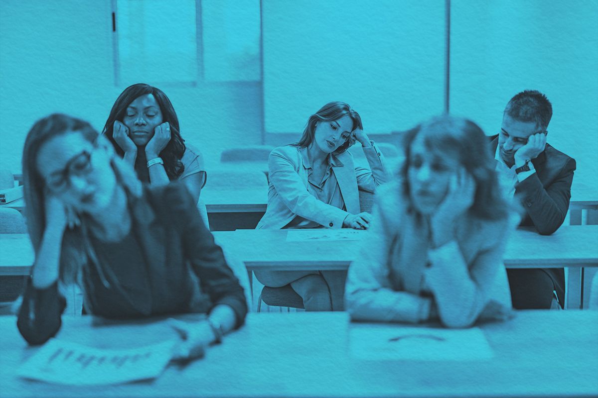 business team showing signs of boredom and fatigue