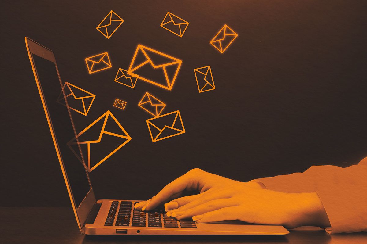 Typing on computer sending and receiving emails concept