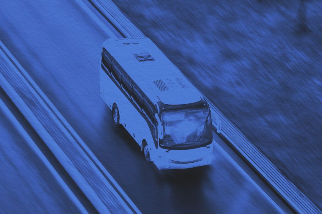 Bus in motion on road
