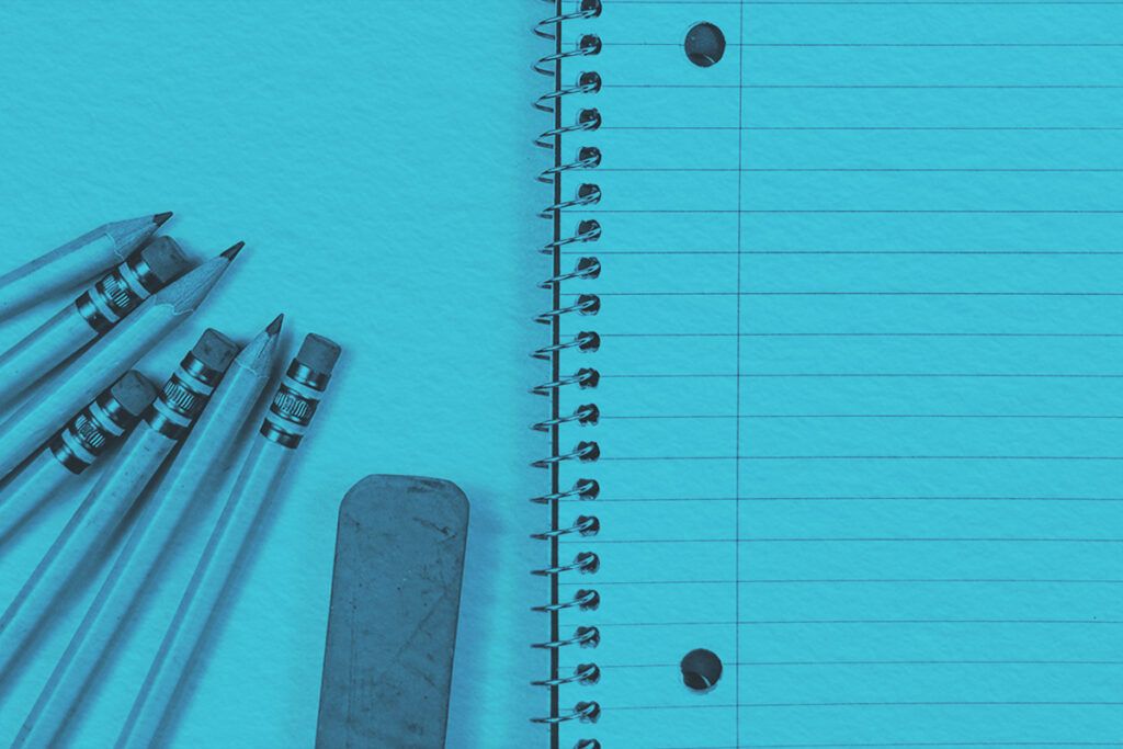 Yellow pencils, ruler, and a spiral notebook