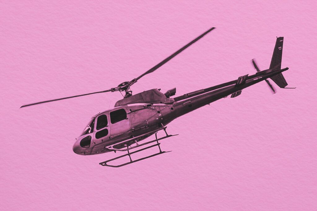 Helicopter against plain sky