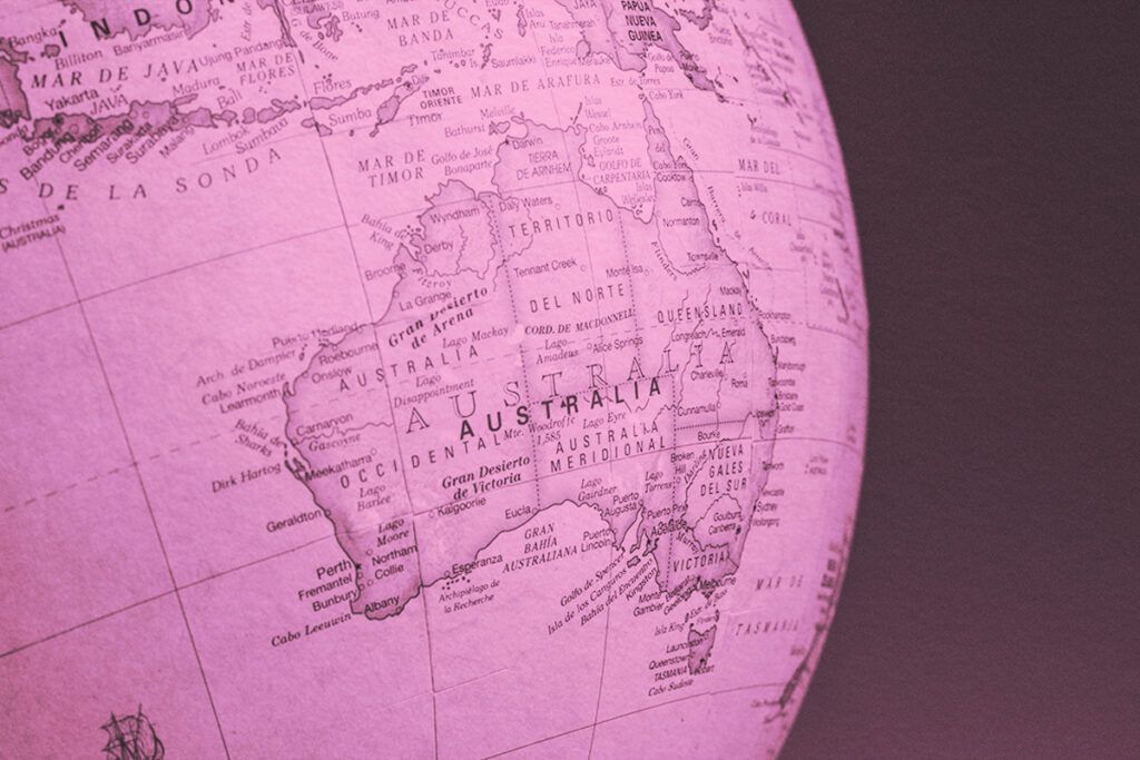 A close-up of a vintage map globe showcasing Australia